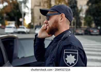 Police Officer Talking On The Phone, Car Parking