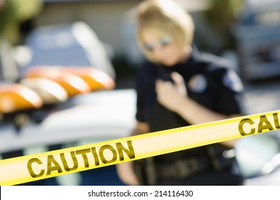 Police Officer Using Two-Way Radio