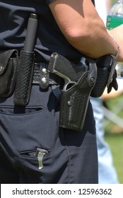 Police Officers Gun Holster From Behind