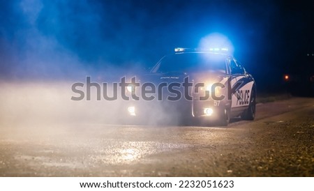 Police Officers in Patrol Car Cruising Seedy Streets of a City Ready to Arrest Criminals. Cops Driving Through Mist, Following Suspect on Road, Scanning Area, Patroling with Siren Lights