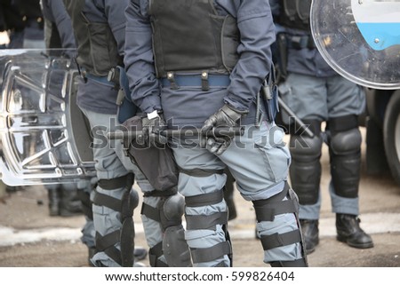 police in riot gear during the anti-terrorism control in the city