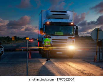 Police At A Roadblock In Botswana, Night Time Checking Papers Of Front Line Workers Truckers Transporting Essential Goods