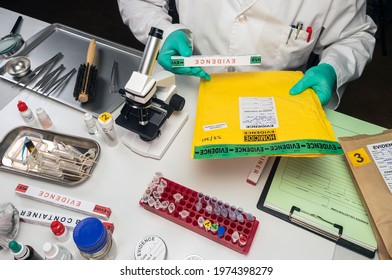 Police Scientist Takes Data From Evidence Box In Crime Lab, Conceptual Image