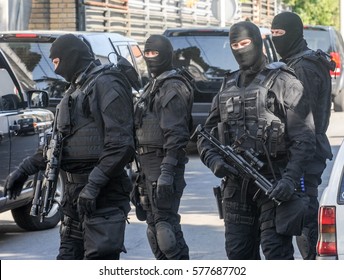 Police SWAT team members during arrest action