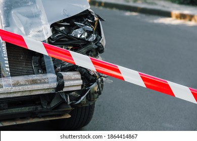 Police Tape On Road In Front Of Car Accident. Crashed Suv Car In Road Traffic Accident. Cars Collision Due To Drunk Driving, Auto Insurance, Fatal Accident