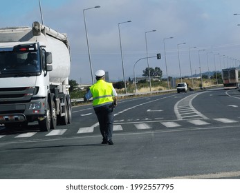 Police Traffic Policeman On The Road Yellow Jacket Turn