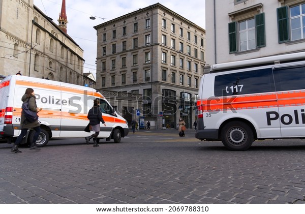 Police van on bridge of the old town of\
Zürich during police operation at a cloudy autumn afternoon. Photo\
taken November 5th, 2021, Zurich,\
Switzerland.