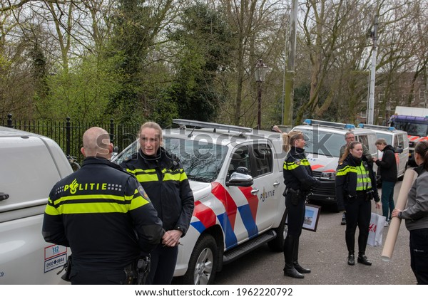 Police At\
Work At Amsterdam The Netherlands\
18-3-2020