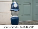 Policeman bollard outside disused police station in Belgravia, London