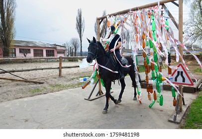 Policeman Training A Horse On An Obstacle Courses. June 12, 2018. Kiev, Ukraine