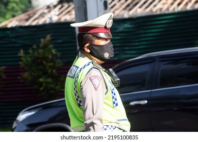 A Policeman Wearing Policeman  Uniform On Duty In The Street, Medan, August 17, 2022