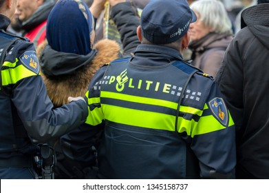Policemen In A Crowd At Amsterdam The Netherlands 2019