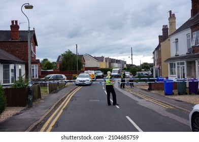 Policewoman Standing Behind Crime Scene Tape After A After A Bomb Scare In A House On Wyberton West Road. BOSTON Lincolnshire, UK June 2021