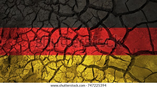 policy, crisis and national security\
concept - german flag on cracked ground\
background
