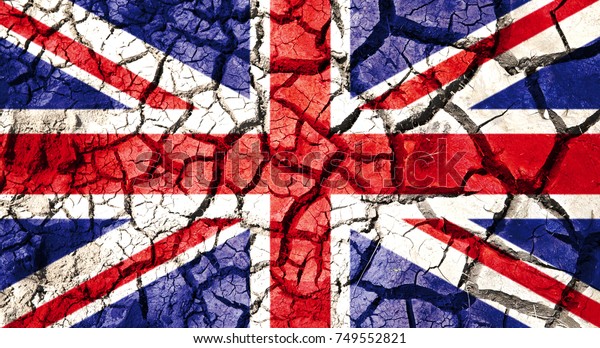 policy, crisis and national\
security concept - flag of great britain on cracked ground\
background