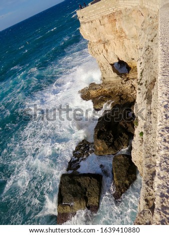 Similar – Aerial Drone View Of Dramatic Ocean Waves Crushing On Rocky Landscape