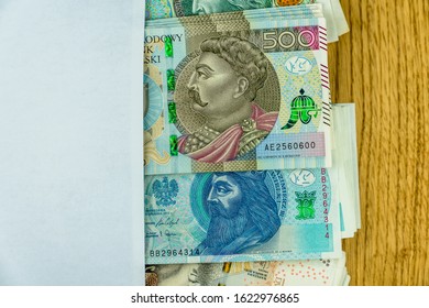 Polish 100, 200 And 500 Zl Banknotes In An Envelope