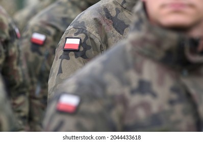 Polish Armed Forces. Armed Forces of the Republic of Poland. Flags of Poland on military uniform. Polish army. - Shutterstock ID 2044433618