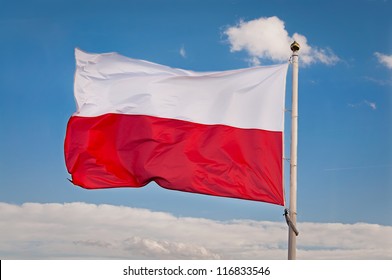 Polish Flag Against The Sky