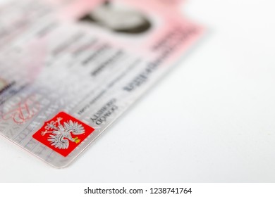 Polish ID Card On A White Table. An Identification Document With Polish Serving To Legitimize The Residents. Light Background.