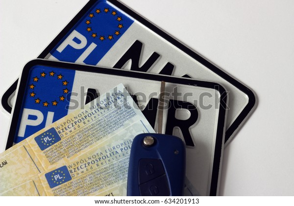Polish license plate, key, registration\
certificate and driving\
license.