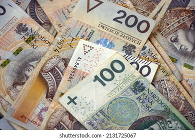 Polish money. Single hundred banknote on two hundred polish zloty background. Polish currency close up. Money inflation, growing prices or savings.