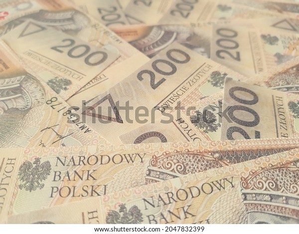 Polish\
money. Stack of bank note from Poland. 200 zl. Two hundred polish\
zloty. Polish currency close up. Money exchange.\
