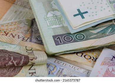 Polish money. Polish zloty banknotes placed next to each other and are the backdrop to many various financial matters. PLN currency. - Shutterstock ID 2165373787