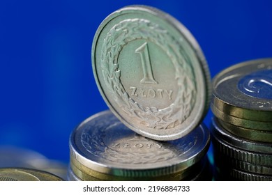 Polish money. Polish zloty coins arranged next to each other and are the backdrop to many various financial matters. PLN currency. - Shutterstock ID 2196884733
