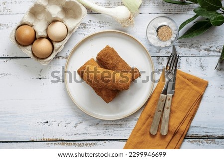 Polish traditional vegetarian krokiety snack served for breakfast. Croquet are filled with meet, fried in oil, and served as an appetizer, side dish, or dinner Zdjęcia stock © 