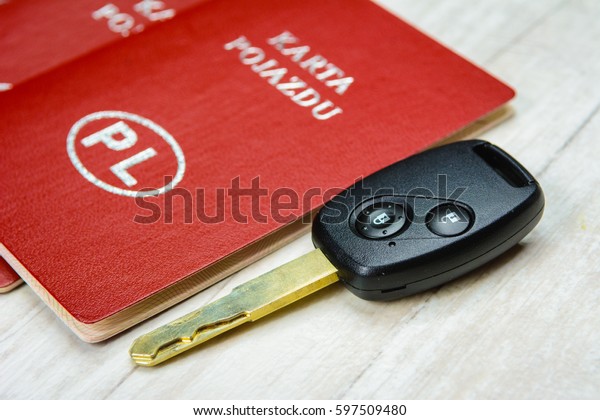 Polish vehicle\
identification card and car keys.\
