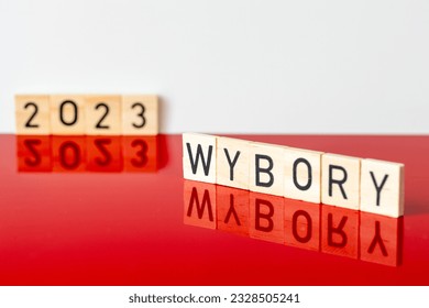 Polish white and red colors and the word WYBORY in Polish for the parliamentary elections and the year 2023, The concept of elections in Poland