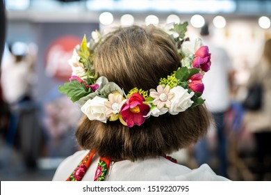 Polish Woman In Traditional Polish Folk Dress Wearing A Flower Crown.