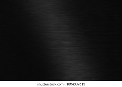 Polished black metal background. Striped abstract texture.