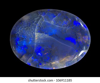 Polished Black Opal Isolated On Black.