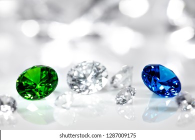 Polished Jewels, Diamond, Blue Sapphire And Green Emerald, Flawless Brilliant Cut