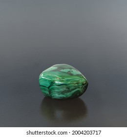 Polished Malachite On Dark Background