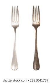 Polished and tarnished sterling silver fork handles, old and often used. Hydrogen sulfide and oxygen in the air react with the outermost layer of the metal and gives a thin, dark layer of corrosion.