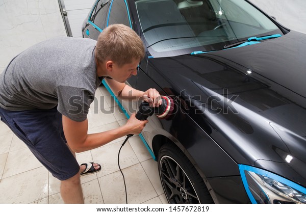 The polisher polishes the body of the vehicle\
with special wax to protect the car from minor scratches and\
damage, using a polishing eccentric machine to cover black fender\
after washing. Auto service