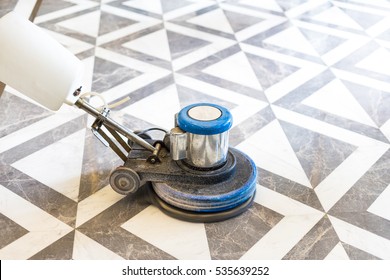 Polisher Working On Marble Floor In Modern Office Building