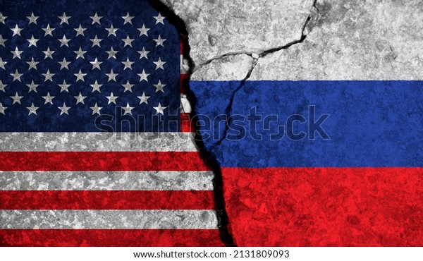 Political relationship between USA\
and russia. National flags on cracked concrete\
background