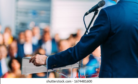 Politician during election campaign, speaking to the crowd from stage - Shutterstock ID 1674481600