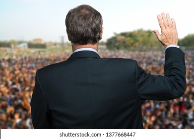 Politician Talking And Making An Oath With His Arm Raised