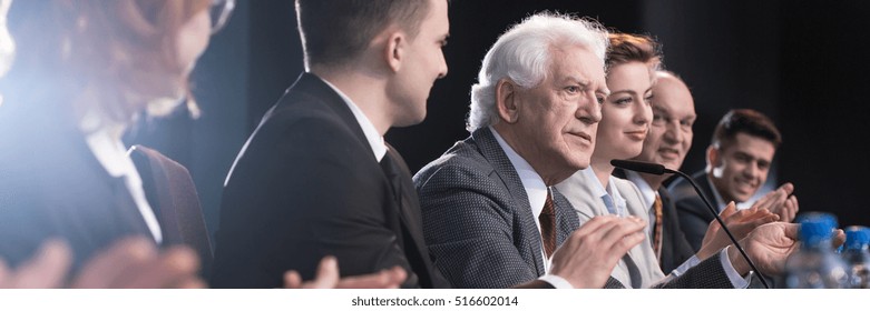 Politicians electing for government presenting their campaigns during press politician conference, Older man speaking the microphone - Shutterstock ID 516602014