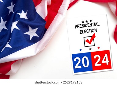 Politics and voting concept. Presidential election 2024 text on white paper over the American flag background - Powered by Shutterstock