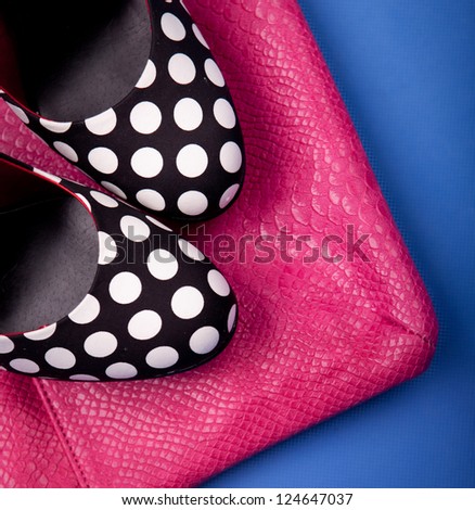 Polka dot high heels and snakeskin print bag