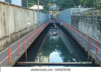 Polluted Black Dirty Wastewater Canal In City  Community Of Bangkok