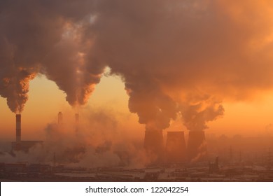 Polluting factory at dawn. also see video 3152725