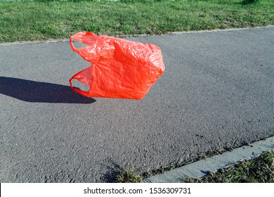 Pollution Concept. Plastic Bag, Flying In The Wind In The Street.