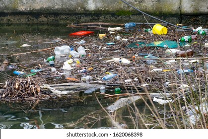 Pollution Of The Danube. Water Polution. Plastic And Other Residues Thrown Into The River. Romania, Orsova. January,19,2020